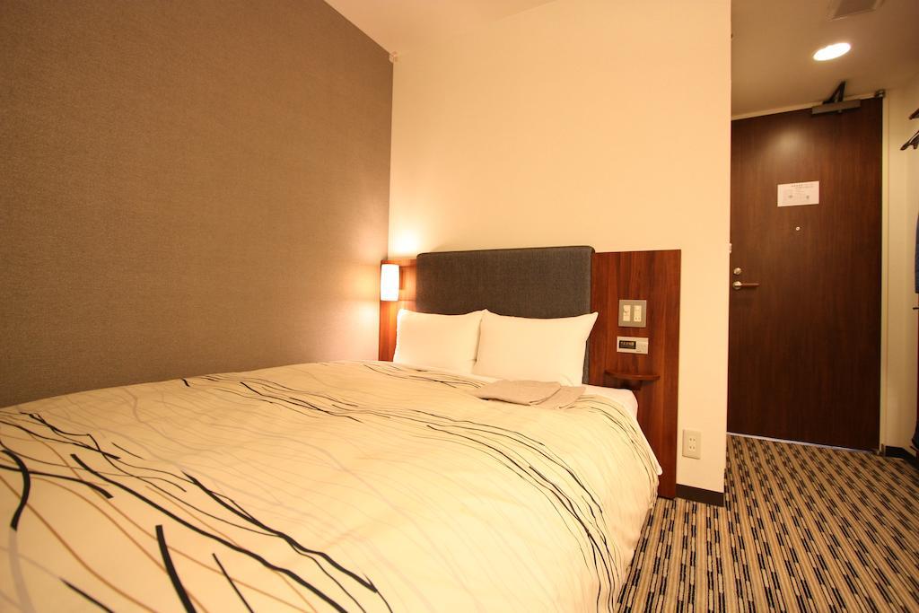 Uozu Manten Hotel Ekimae Номер фото