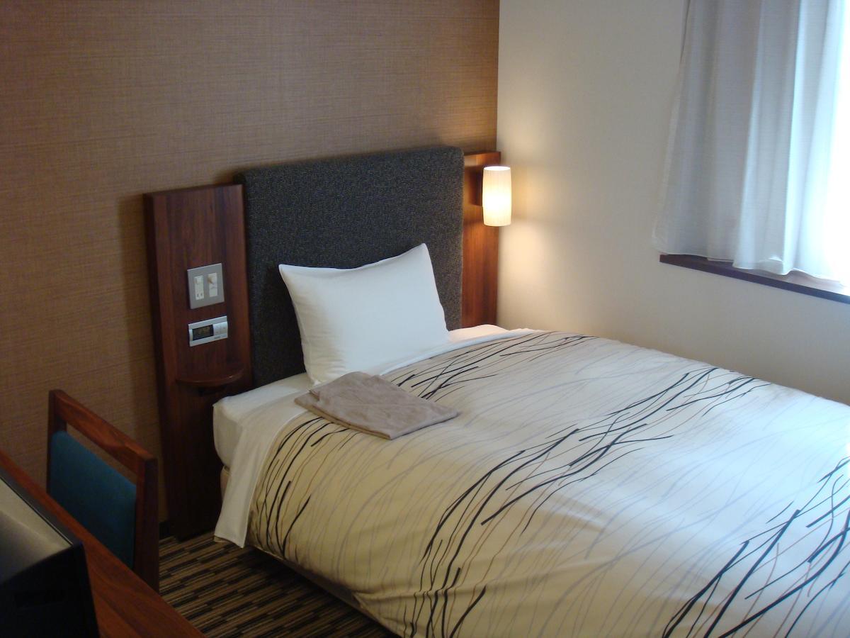 Uozu Manten Hotel Ekimae Номер фото